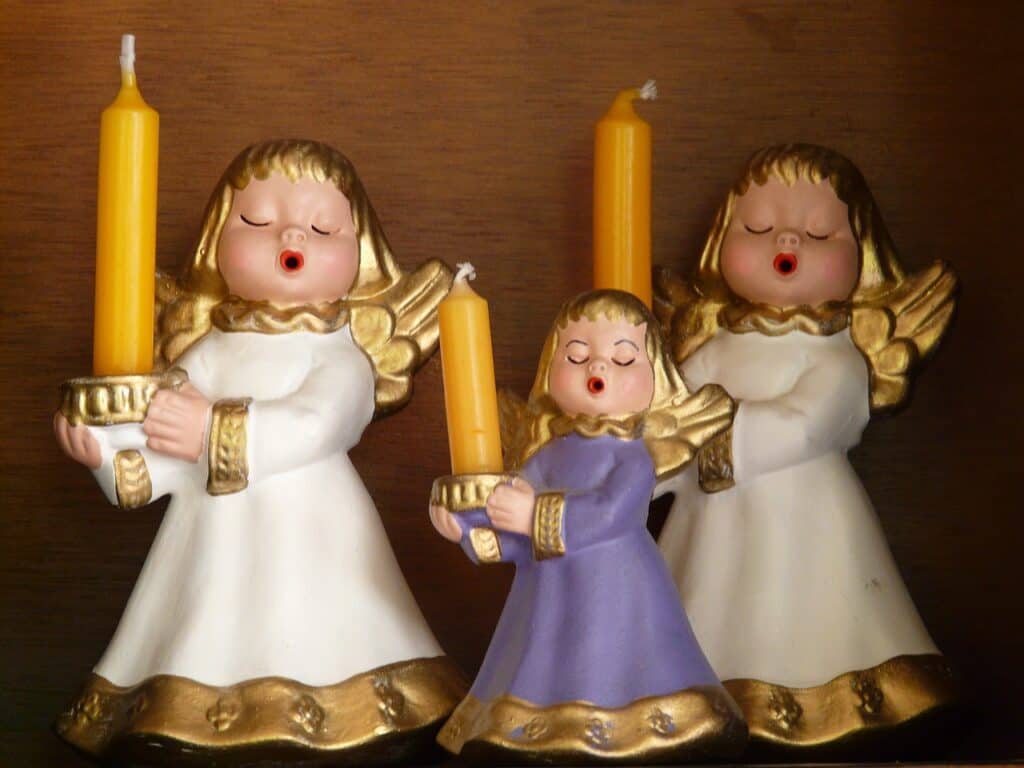 Photo of three Angels singing for blog post, Merry Christmas 2023